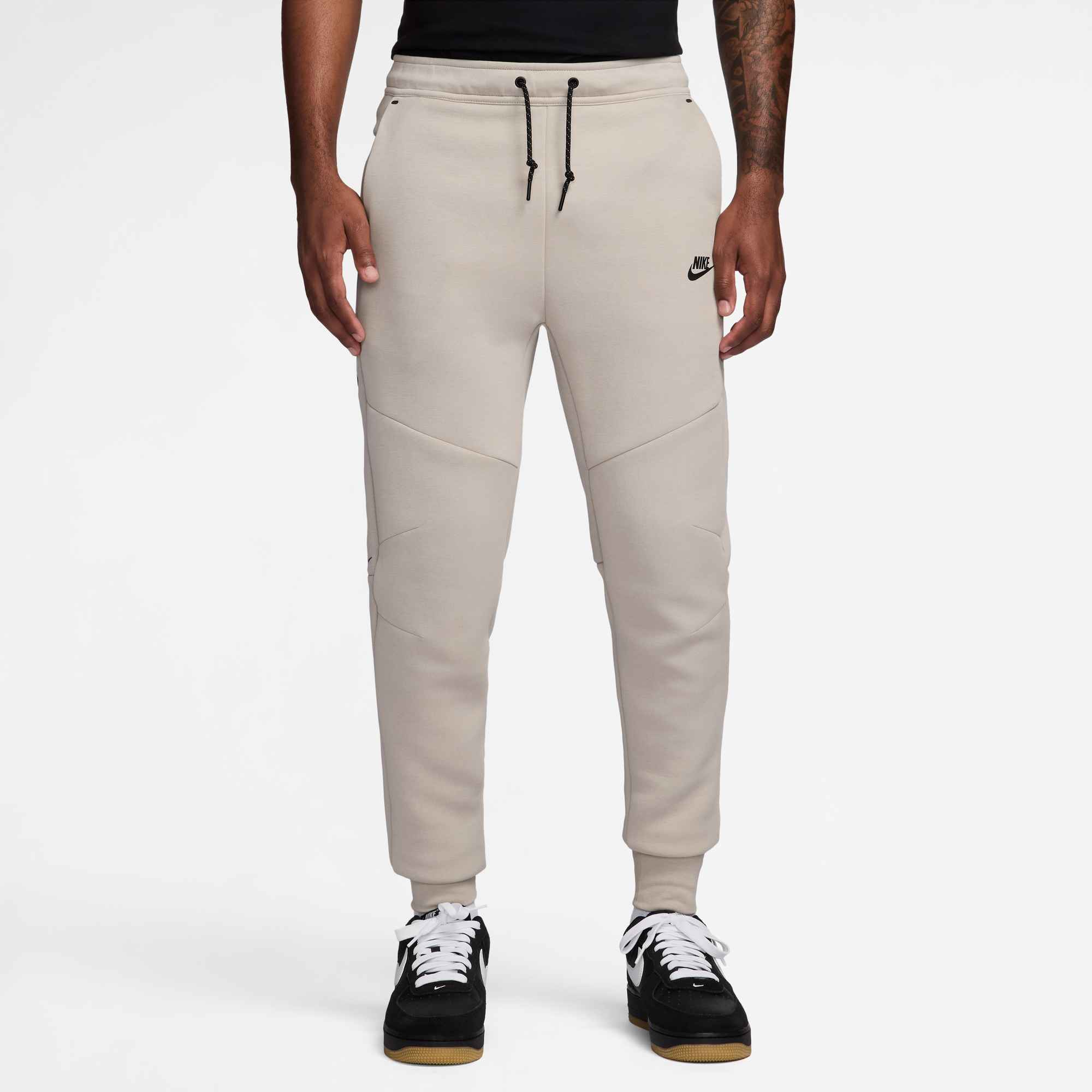 NIKE M NK TCH FLC JGGR Freizeithosen NIKE ORANGE DARK S